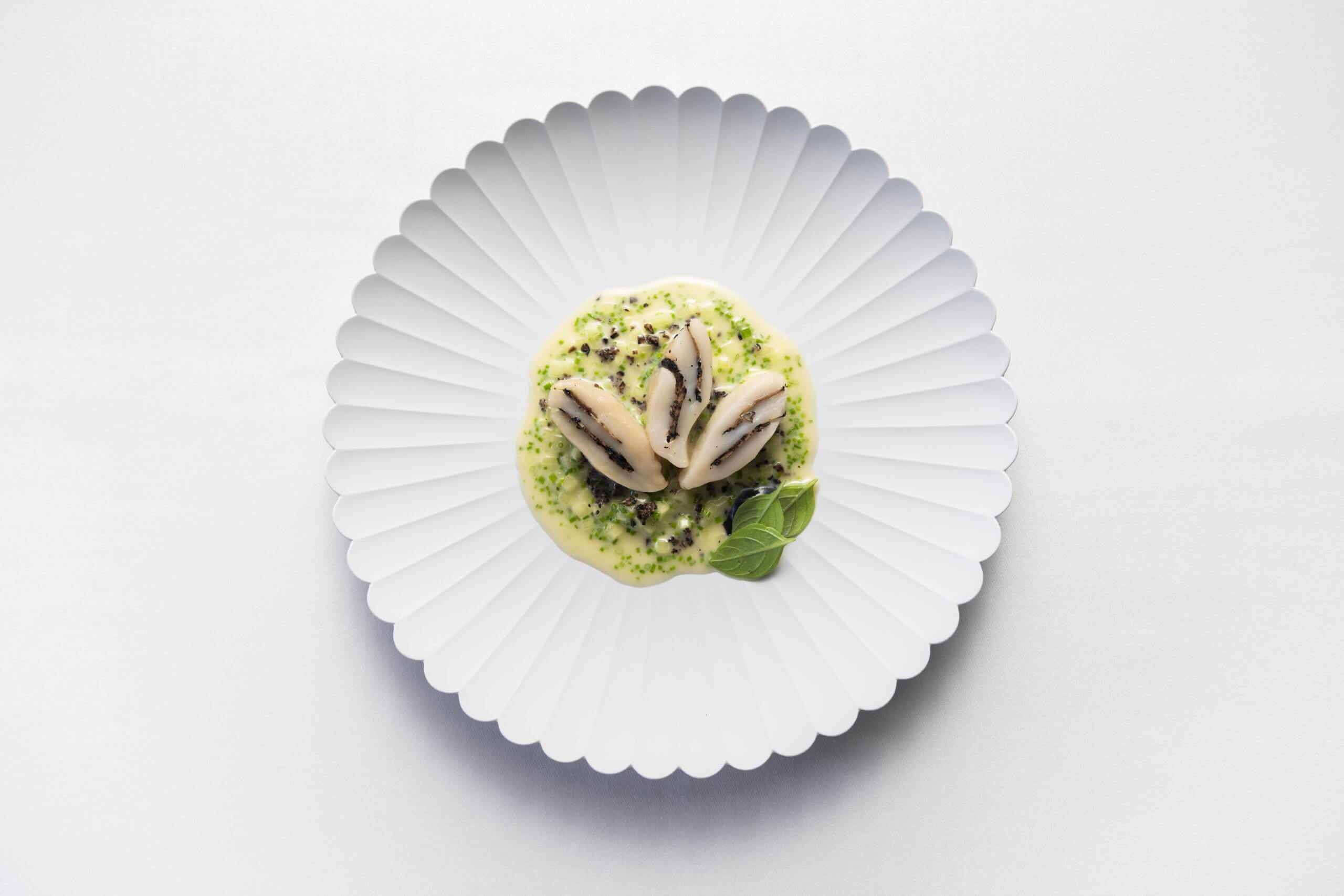 Scallop and black truffles with Granny Smith apple and verjus beurre